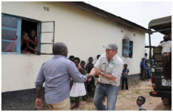 Head Teacher Mwanza Shadreck greets Connect Africa Director Dion Jerling